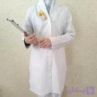 روپوش پزشکی زنانه کاسپین سفید | روپوش پرستاری و پزشکی فلامنت کج‌راه با دوخت صنعتی