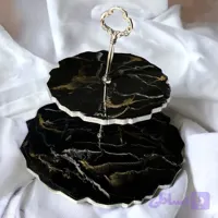 شیرینی خوری دوطبقه از جنس چوب ورزین رنگ مشکی بارگه های طلایی و نقره ای سایز25سانت