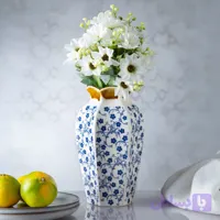 گلدان خمره ای شکوفه آبی