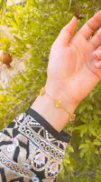 دستبند ونکلیف طلایی رنگ ثابت دارای بند اضافه برای تنظیم