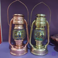 فانوس مسی و برنجی ابکاری نانو در دو رنگ دارای شمع کار شیک و دکوری و مناسب هدیه