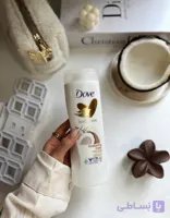 لوسیون بدن داو مدل Restoring Care حاوی روغن نارگیل و شیر بادام مناسب پوست خشک حجم 400 میل Dove Restoring Care Model Body Lotion Containing Coconut Oil And Almond Milk Suitable For Dry Skin 400 Ml
