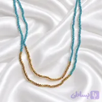 گردنبند دو ردیفه مهره‌ای فیروزه‌ای طلایی مراقبتی