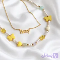 گردنبند مرواریدی مراقبتی با آویز هانی و پروانه