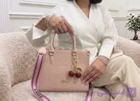 کیف دوشی زنانه coach به همراه آویز آلبالو