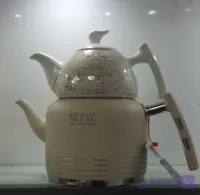 کتری قوری نزاز NEZAZ رنگی 2.5 لیتری رنگی قوری چینی دسته استیل کف چدن کد 2408