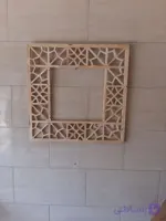 قاب آینه چوبی روسین مدل گره چینی