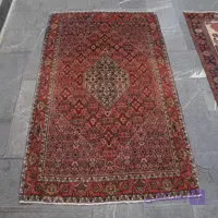 فرش دستبافت + مشخصات کامل فرش دستباف بيجار طرح لچک و ترنج سایز ذرع و نيم رنگ زمینه نارنجي رنگ حاشیه نارنجي کد ۳۸۸۹۹ - هنرظریف