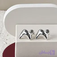 گوشواره میخی زنانه طرح دفرمه موج‌دار برجسته نقره‌ای