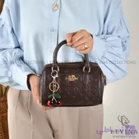 کیف دخترانه صندوقی آمیتیس طرح کوچ COACH دارای آویز گیلاس