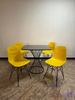 میز و صندلی غذاخوری فایبرگلاس پایه میله ای اسپایدر طرح دار السا میز برتویا پایه فلزی