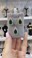 نیم‌ست نگین‌دار طرح طلا با نگین‌های مخراج‌کاری شده