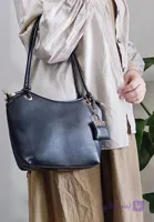 کیف زنانه شیک و ساده همراه بگ چارم