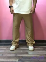 و قیمت شلوار بگ پارچه ای مردانه کرمی از