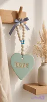 آویز سرامیکی قلبی LOVE با مهره‌های چوبی و روبان طوسی | دکوراسیون بوهمی