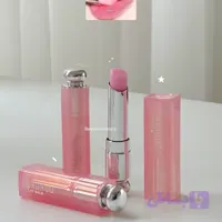 بالم لب حرارتی پینترستی دوپ دوروهو صورتی ملایم پوکه لاکچری جذاب نرم کننده و رنگ دهنده ابرسان لب رایحه توت فرنگی تمشک
