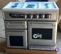اجاق گاز طرح فر ۴ درب رو استیل کیان‌توس
