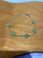 دستبند زنانه ون کلیف مدل پنج گل
