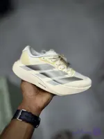 کتونی آدیداس آدی زیرو کرمی نقره‌ای زنانه | Adidas Adizero Evo SL ATR Cream Silver