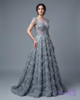 پارچه تور مجلسی کریستال‌دوزی با طرح گل برجسته ۳ بعدی (عرض ۱.۴۰ متر)