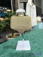 کیف دستی و دوشی زنانه نگین‌دار با طراحی هلالی