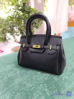 کیف دستی و دوشی زنانه صورتی براق با طراحی شیک