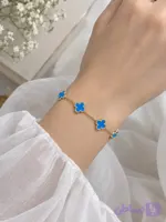 دستبند ونکلیف آبی طلایی دارای سایزر bl5