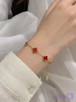 دستبند ونکلیف قرمز طلایی دارای سایزر red5