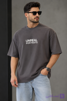تیشرت مردانه یقه گرد اور سایز طرح UNREAL با چاپ برجسته
