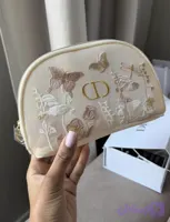 کیف میکاپ دیور مدل گلدوزی dior bag