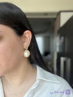 گوشواره دور قاب طلایی میخی