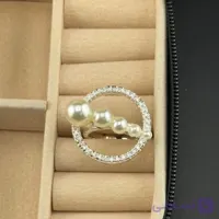 انگشتر زنانه مروارید و نگین مدل هاله دایره‌