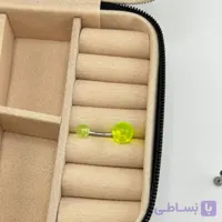 پیرسینگ ناف مدل موزی رنگی