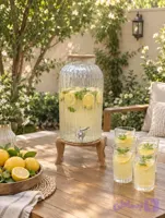 کلمن شیشه ای ده لیتری شیاردار