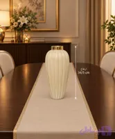گلدان شیشه ای رنگ کرم شیاردارلبه طلایی
