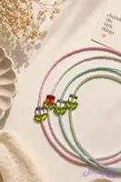 گردنبند پینترستی منجوقی با پلاک لاله