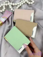 کیف پول زنانه ۹ جاکارتی زه‌دار طرح بربری سبز پاستلی