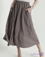 دامن زنانه کرینکل (چروک‌دار) به رنگ بژ مایل به قهوه‌ای (ویزون)، دارای کمر کشی، جیب‌دار