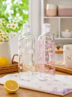 بطری شیشه‌ای درب‌دار طرح پاپیون صورتی