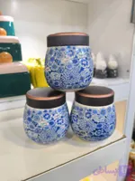 بانکه سرامیکی درب‌دار طرح گل آبی