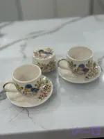 ست فنجون و نعلبکی و قندون سرامیکی دست ساز طرح پرنده آبی