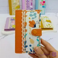 کیف پول جیبی چرمی با نوار کنفی طرح گل لاله نارنجی دست دوز