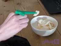چاپستیک انگشتی گیمینگ مدل Snack Finger Clips برای خوردن چیپس و تنقلات بدون کثیف شدن دست
