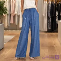 شلوار ‌پارچه ای طرح جین سنگدوزی