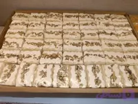 نوقا پر مغز با شیره انگور بسته 600 گرمی(70درصد مغز )