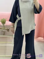 ست شومیز و شلوار زنانه کوپرامکس؛ ست دو تکه شیک با طراحی نامتقارن و کمربند حلقه‌ای