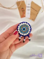 سنجاق سینه با طرح چشم مهر ، نماد زیبایی و حفاظت