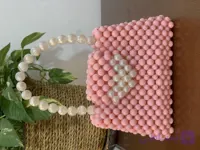 کیف دخترانه دستی مرواریدی صورتی طرح قلب سفید