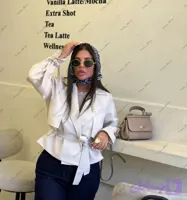 کت زنانه کرم شیری شایندار گلسینه دار
