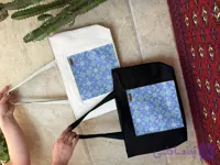 توتبگ پارچه ای مشکی جیب جلو چرم فانتزی نیل ست